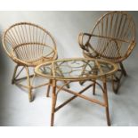 RATTAN ARMCHAIRS, two similar arched woven cane rattan with an oval glazed table, armchair 66cm W.