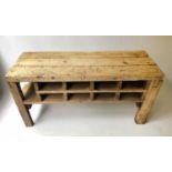 WORKBENCH, early 20th century, pine, of substantial construction, with a nine compartment base,