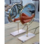 TABLE TOP VANITY MIRRORS, a pair, marble bases. (2)