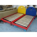 CHILDREN'S BEDS, a pair, polychrome painted finish with design cut into headboards, 195cm x 88cm x