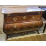 BOMBE COMMODE, late 18th century Dutch mahogany and gilt metal mounted with later cream marble top