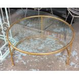 LOW TABLE, circular, gilt metal with bevelled glass top, 35cm H x 69.5cm Diam.