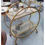 COCKTAIL TROLLEY, gilt metal and glass.