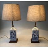 LAMPS, a pair, Delft style blue and white ceramic with Chinoiserie decoration of square form each on