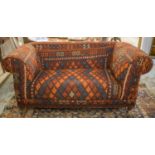 CHESTERFIELD SOFA, red kilim and blue velvet upholstered on mahogany feet and castors, 177cm x 93cm.