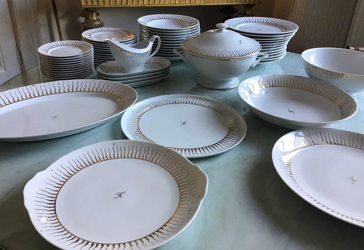 DINNER SERVICE, Limoges hand painted -Solar flair- 12 place 4 piece settings, approx 59 pieces. (