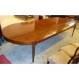 ARTHUR BRETT DINING TABLE, walnut extending with two extra leaves on square tapered supports with