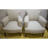 ARMCHAIRS, an en suite pair, Victorian walnut of small proportions in modern ticking upholstery,