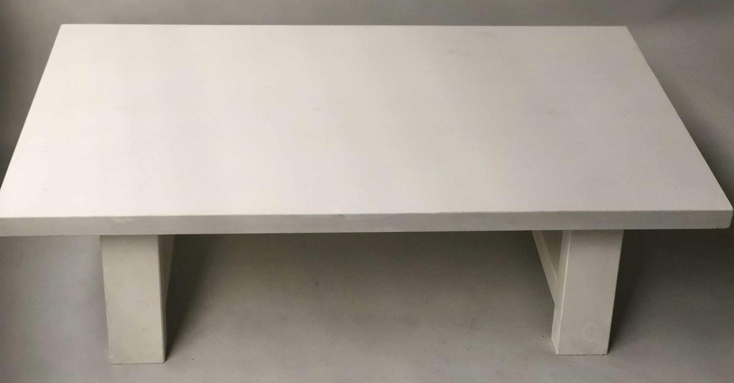 CONRAN LOW TABLE, rectangular white lacquered with broad stretchered supports, 139cm x 79cm x 40cm