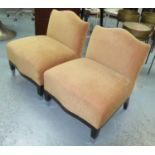 OSBORNE & LITTLE LOW EASY CHAIRS, a pair, 66cm W x 74cm H. (2) (with faults)