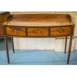 BOWFRONT SERVING TABLE, George III mahogany, circa 1800, with galleried top above three drawers,