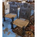 INDIAN PIDHA CHAIRS, a pair, ebonised with rope seats, 71cm H. (2)