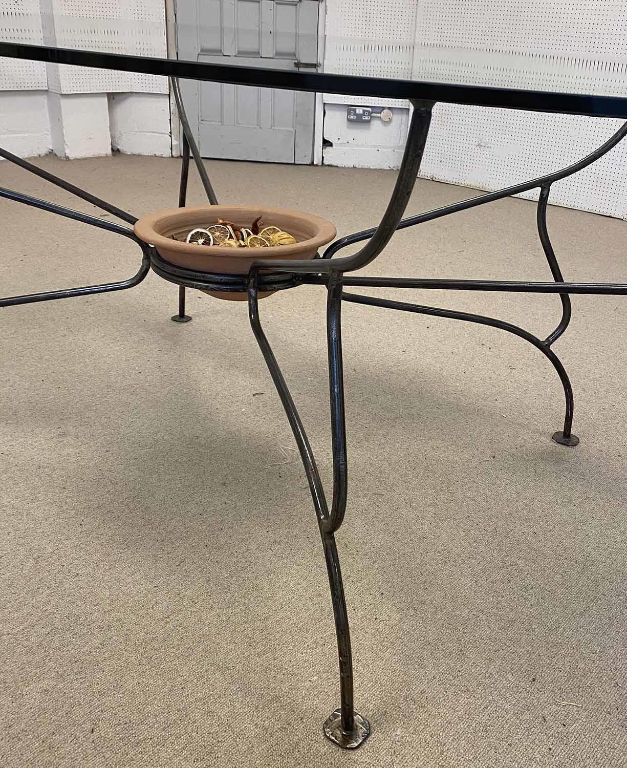 PAULTONS DESIGNS FULHAM DINING TABLE, glass top above a wrought iron base with a terracotta - Image 2 of 5