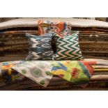 RIFAT IKAT SILK CUSHION COVERS, set of six, including two cushion pads.