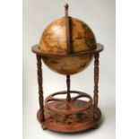 'GLOBE' COCKTAIL CABINET, in the form of an antique terrestrial globe on stand with rising lid and