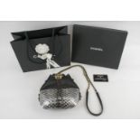 CHANEL GABRIELLE PURSE, black leather top with silver python bottom, drawstring closure with