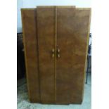 ART DECO WARDROBE, walnut with two panelled doors enclosing a hanging rail, hooks, glazed fronted