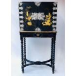 CABINET ON STAND, 18th century Chinese export decorated gilt and black lacquer with two doors