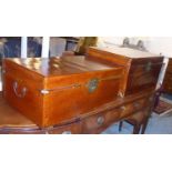 TRUNKS, two, early 20th century parchment leather each with a rectangular rising top, a handle to