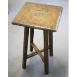MILITARY OCCASIONAL TABLE, 19th century teak with square top bearing the star badge of the