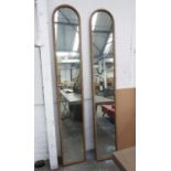 PIER MIRRORS, a pair, gilt frames, antiqued plate, 213cm x 36cm. (2)