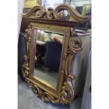 WALL MIRROR, scrolling gilt frame with Italian city names and bevelled plate, 163cm x 122cm.