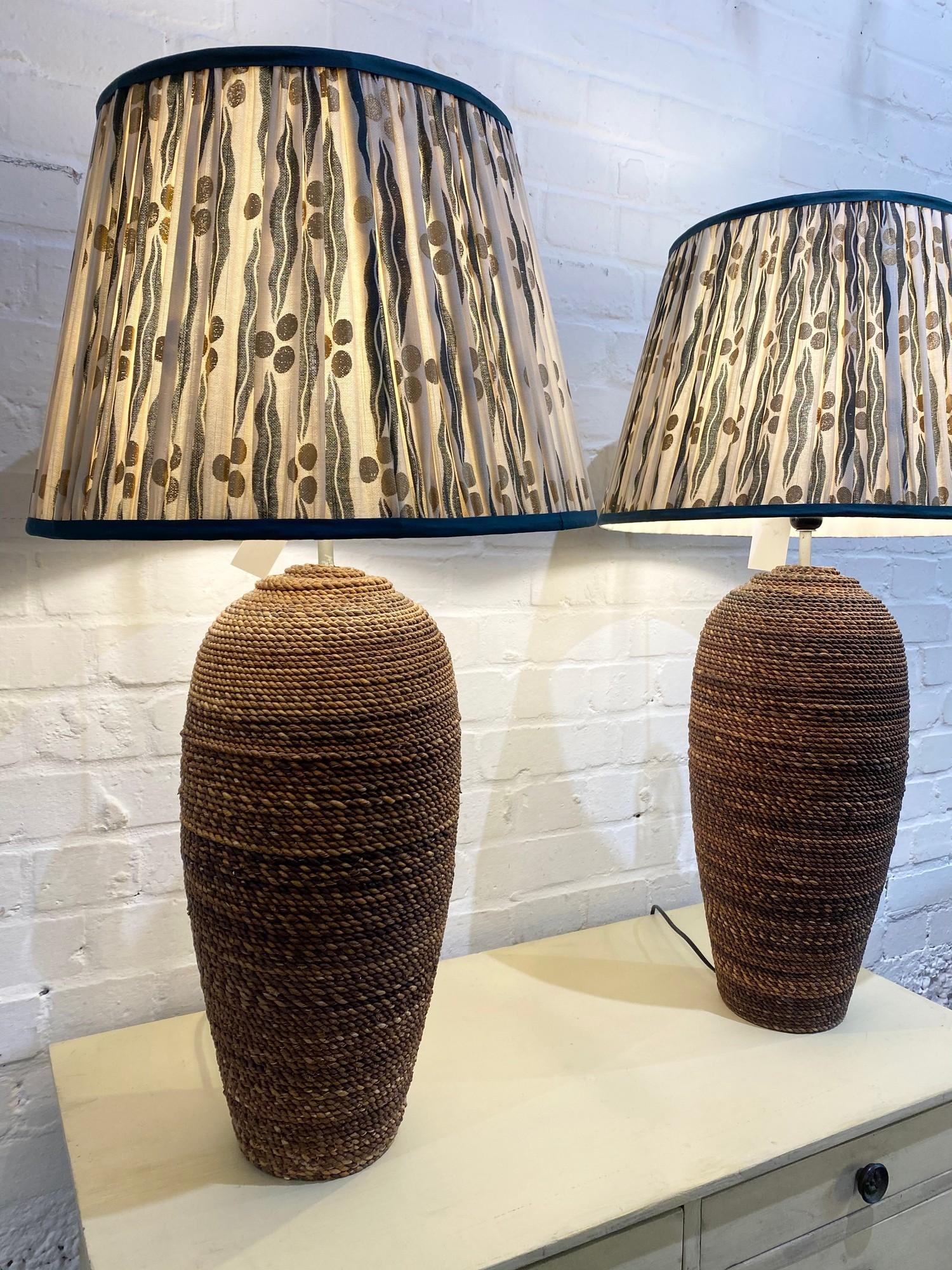 RATTAN TABLE LAMPS, a pair, with Pooky Empire shades, 87cm H. (2)