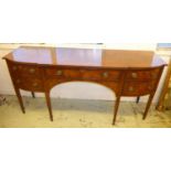 BREAKFRONT SIDEBOARD, George III style mahogany with a long frieze drawer flanked by a false
