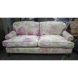 GEORGE SMITH SOFA, in faded white and pink rose patterned upholstery with two seat cushions, 190cm