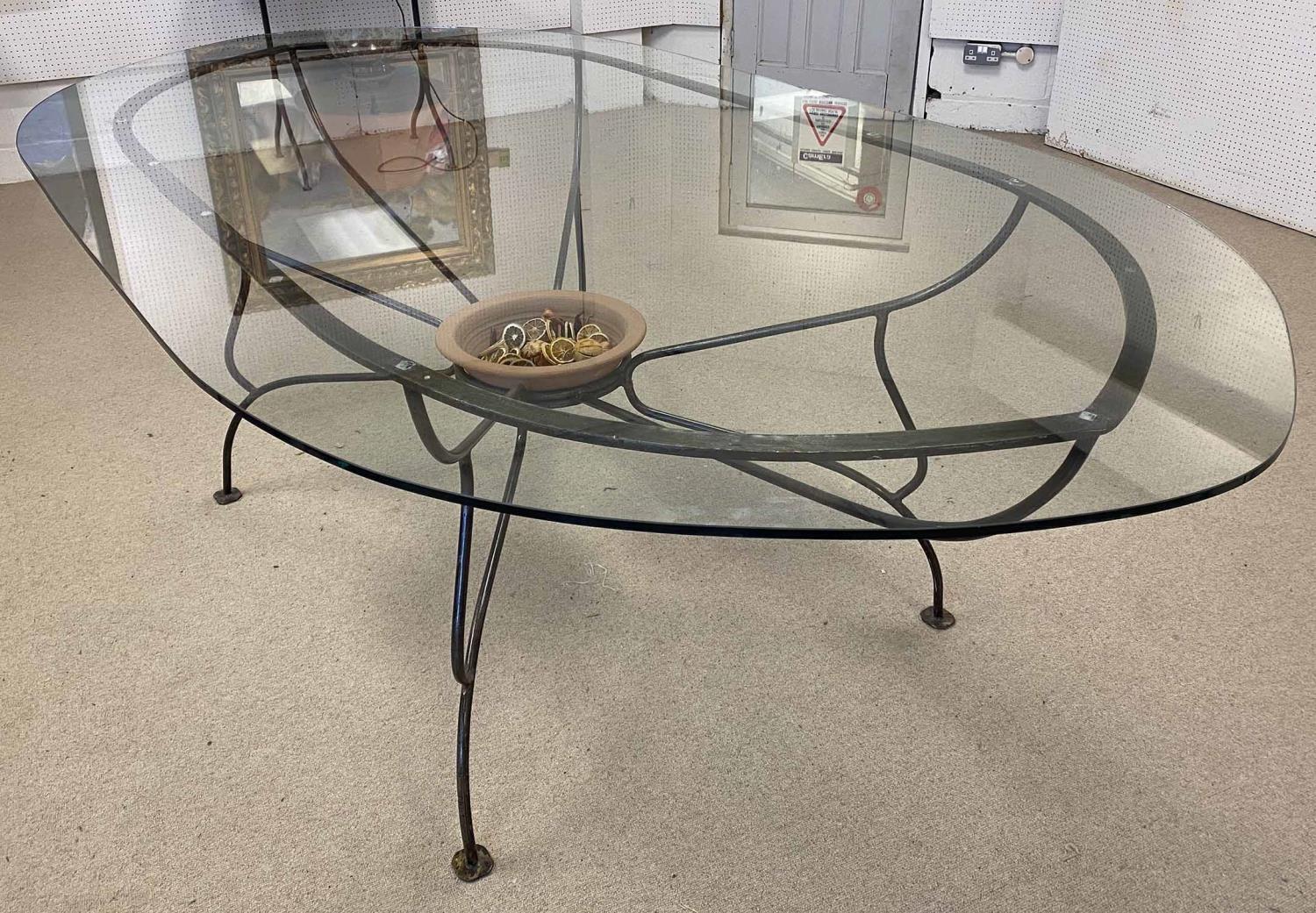 PAULTONS DESIGNS FULHAM DINING TABLE, glass top above a wrought iron base with a terracotta