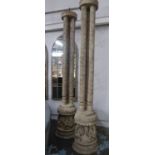 CARVED INDIAN PILLARS, a pair, of substantial proportions, carved Ganesh detail to base, 240cm H x