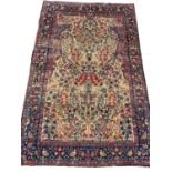 FINE ANTIQUE KERMAN LAVER RUG, 217cm x 140cm, millefleur design.