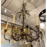 CHANDELIER, six branch patinated metal with gilt foliate detail and glass drops 105cm H x 81cm W. (