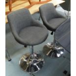 BAR STOOLS, a set of three, contemporary, height adjustable, grey fabric upholstered, 107cm at