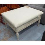 FOOTSTOOL, with an upholstered seat on a distressed cream painted base, 92cm x 72cm x 52cm.