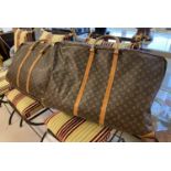 LOUIS VUITTON HOLDALL CASES, two, largest 66cm L x 45cm. (with faults)