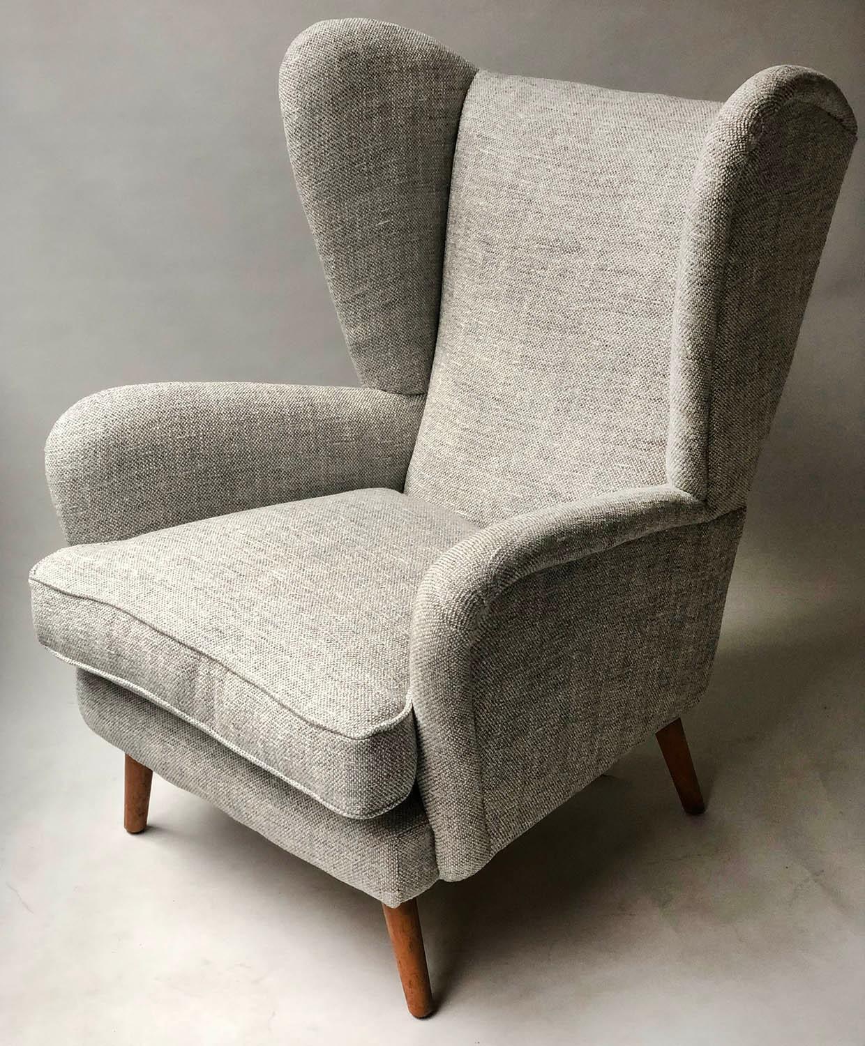 HOWARD KEITH ARMCHAIR, 1950's lounge chair newly upholstered in oatmeal soft tweed with splay