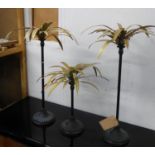 PALM LEAF CANDELABRA, a set of three, 73cm at tallest. (3)