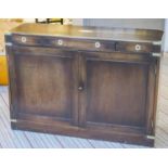 SIDE CABINET, campaign style mahogany and brass bound with three drawers above two doors, 77cm H x