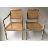 ARMCHAIRS, a pair, Regency style painted and cane panelled. (2)