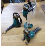 CONTEMPORARY SCHOOL, a set of three swimming frogs, 25cm H. (3)