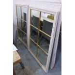 WALL MIRRORS, a pair, white painted with gilt accents, 79cm x 114cm. (2)