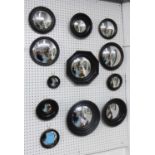 WALL MIRRORS, a collection of twelve, regency style of various sizes and descriptions, ebonised