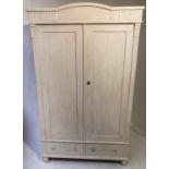 ARMOIRE, 19th century French, traditionally grey painted with two panelled doors enclosing hanging