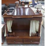 TEMPLE DOG BED, mahogany with carved front pillars, 96cm W x 44cm D x 115cm H.