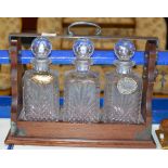 OAK 3 BOTTLE TANTALUS WITH SET OF 3 DECANTERS