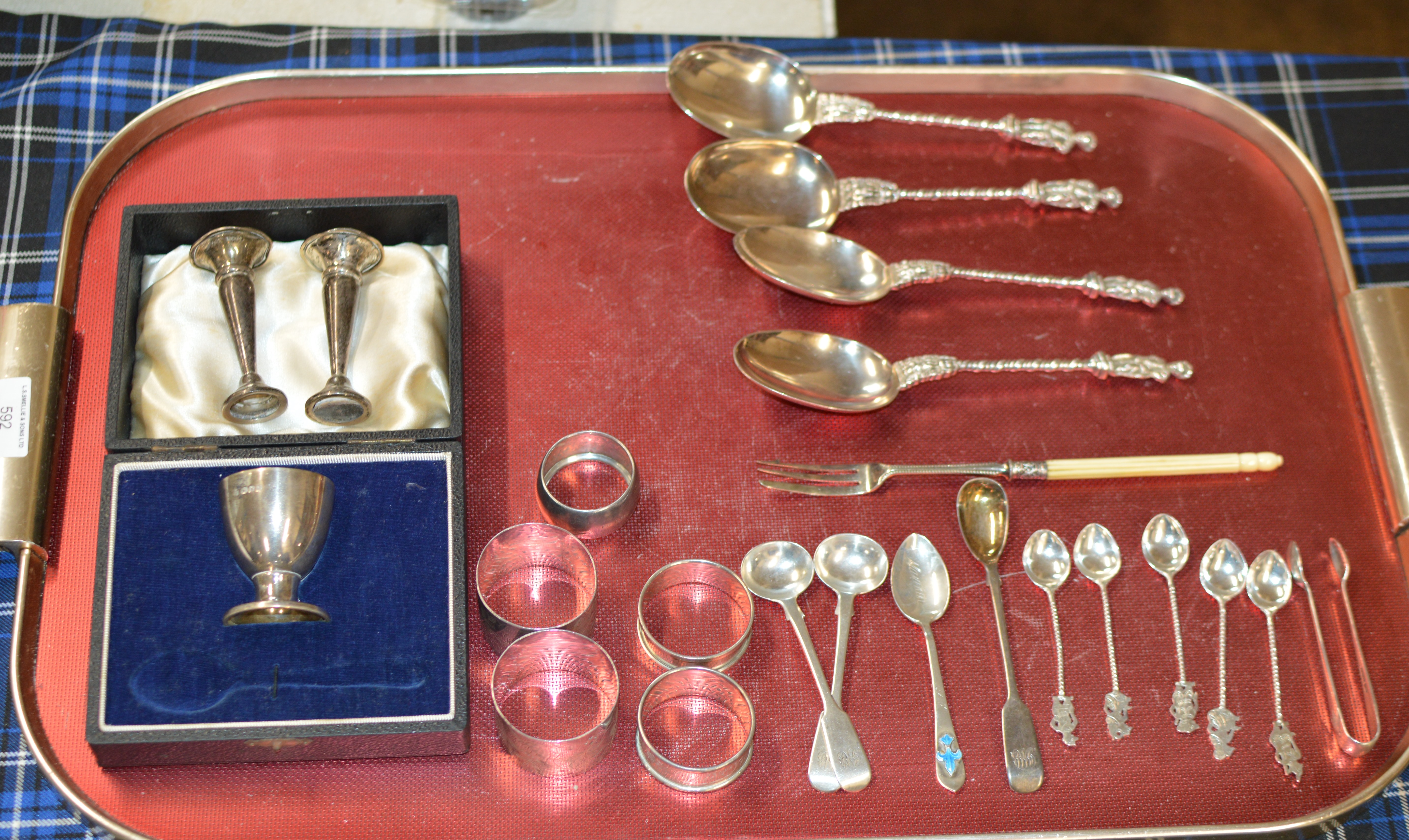 TRAY WITH A SILVER EGG CUP, SILVER FLOWER VASES, VARIOUS SILVER NAPKIN RINGS, VARIOUS SILVER