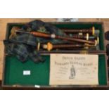 CASED SET OF OLD WOODEN BAGPIPES MARKED P. HENDERSON WITH CHANTER