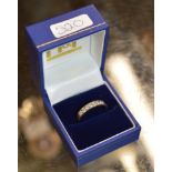 9 CARAT WHITE GOLD 7 STONE DIAMOND RING - APPROXIMATE WEIGHT = 2.5 GRAMS