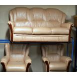 3 PIECE PEACH LEATHER LOUNGE SUITE WITH WOOD TRIM COMPRISING 3 SEATER SETTEE & 2 SINGLE ARM CHAIRS